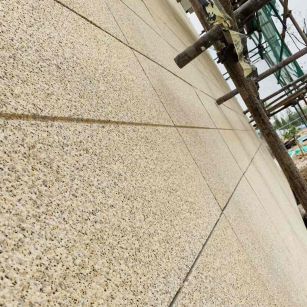 荆门 黄金麻花岗岩荔枝面外墙干挂石材效果示例