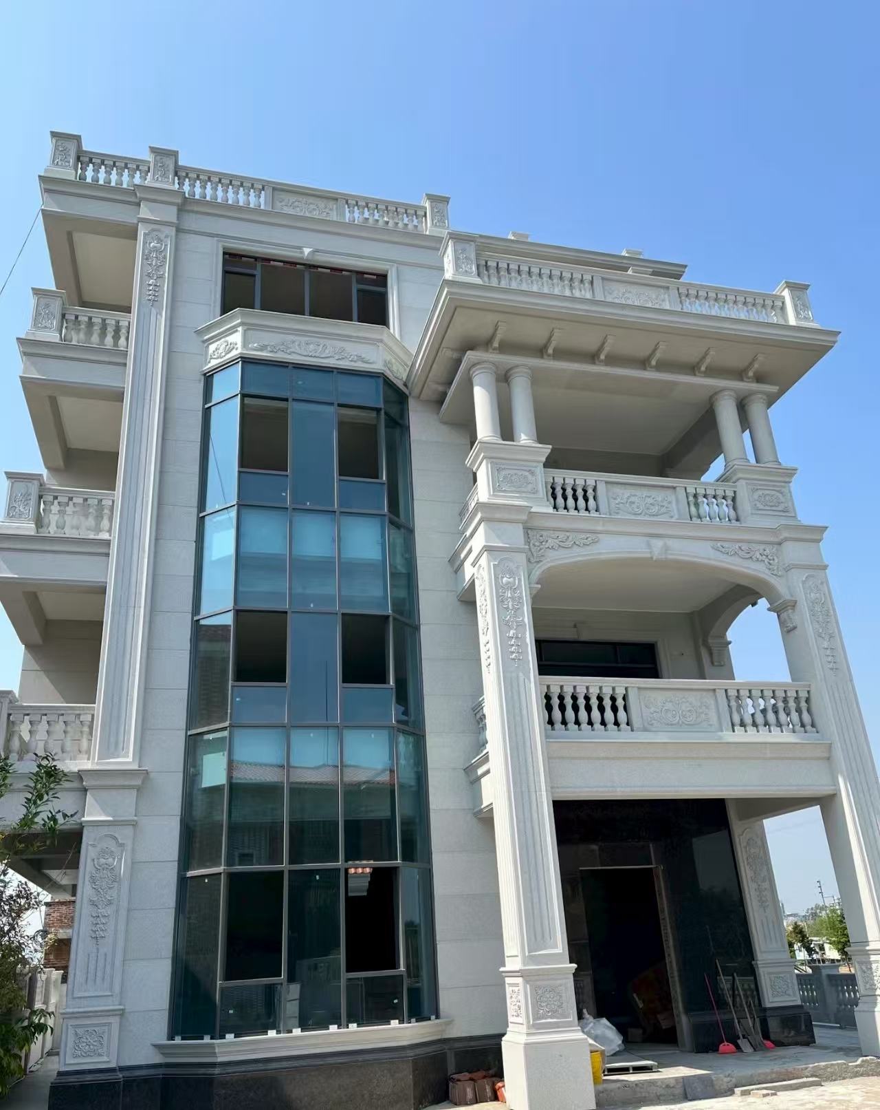 荆门 白麻花岗岩别墅外墙干挂效果展示